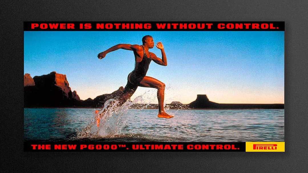 Pirelli poster of Carl Lewis running over water.