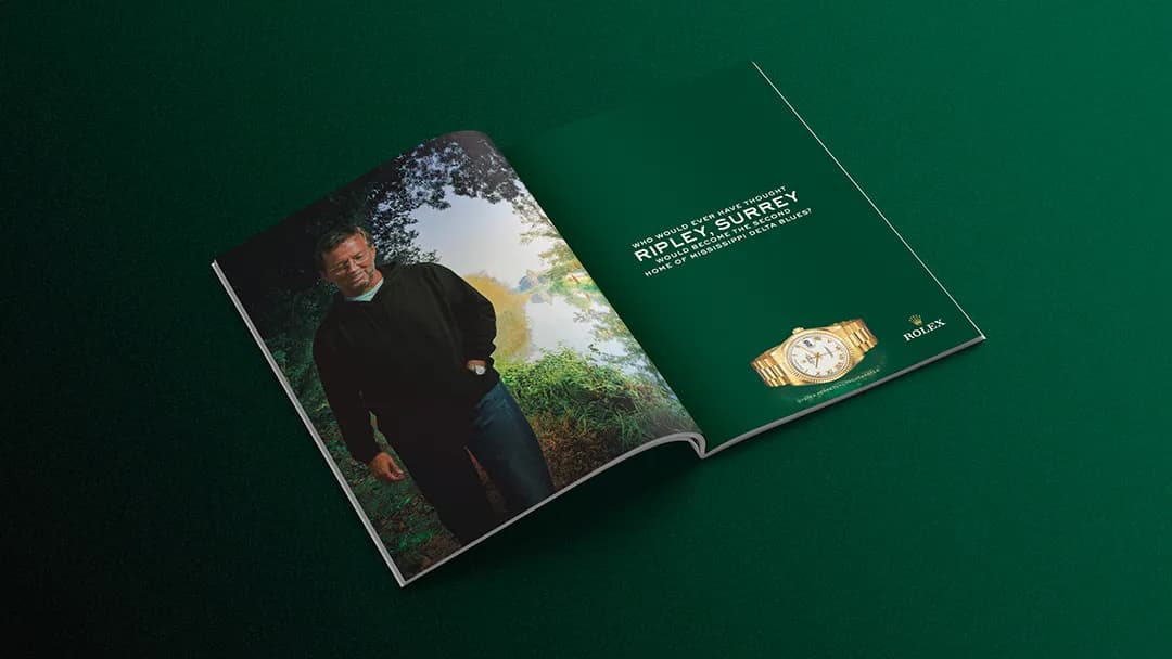 Rolex magazine spread, Eric Clapton with the headline "Who would have thought Ripley Surrey would become the second home of Mississippi blues".
